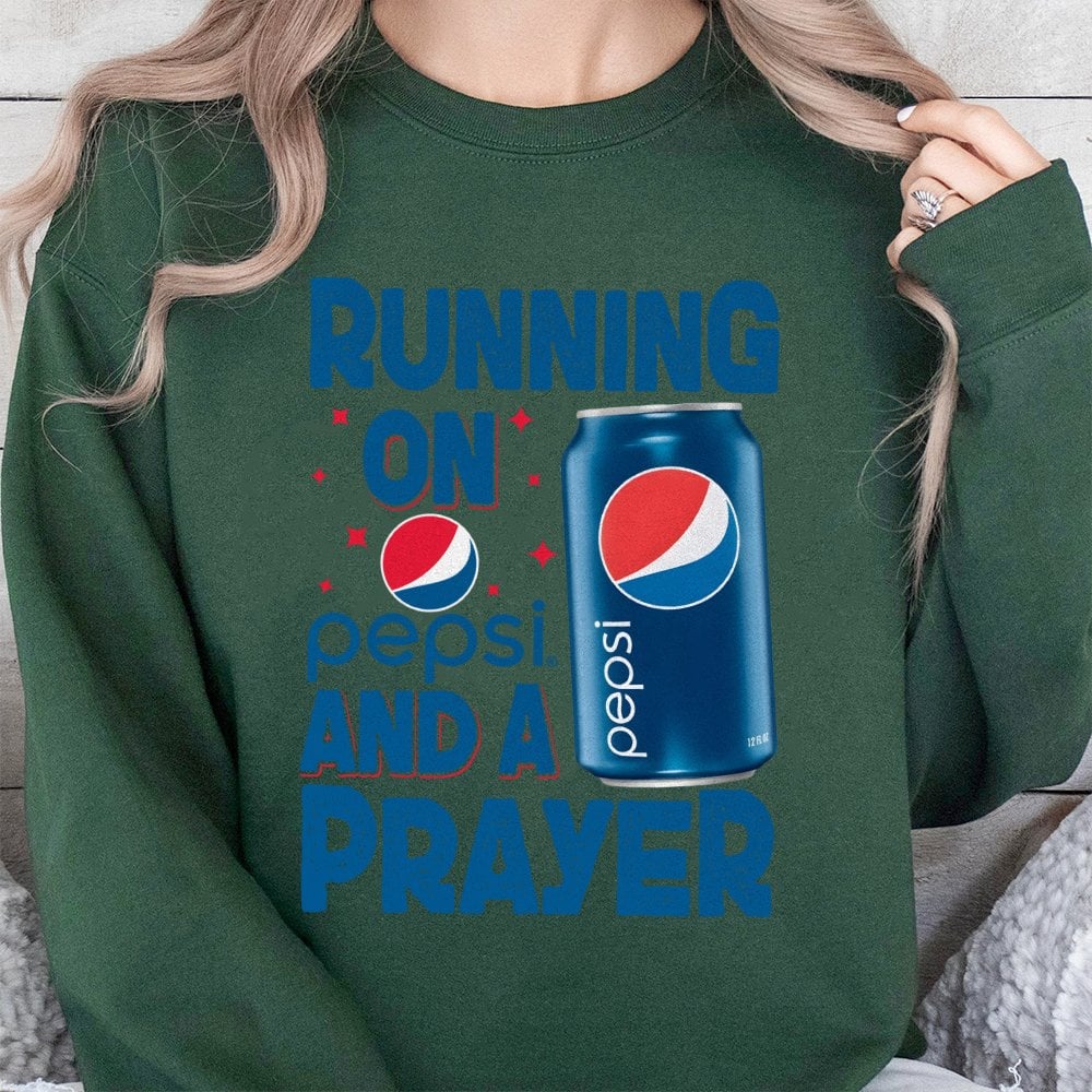 Soda Lover Graphic Sweatshirt | Running On Pepsi And A Prayer Design | Soft Cotton Blend Crewneck | Funny Gift For Caffeine A
