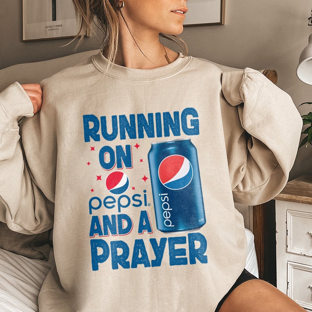 Soda Lover Graphic Sweatshirt | Running On Pepsi And A Prayer Design | Soft Cotton Blend Crewneck | Funny Gift For Caffeine A